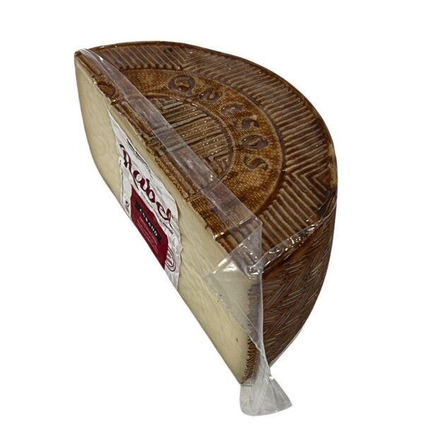 Queso Mezcla Curado - Rabel Cuña de queso de mezcla curado en cava Rabel tres leches La Mancha