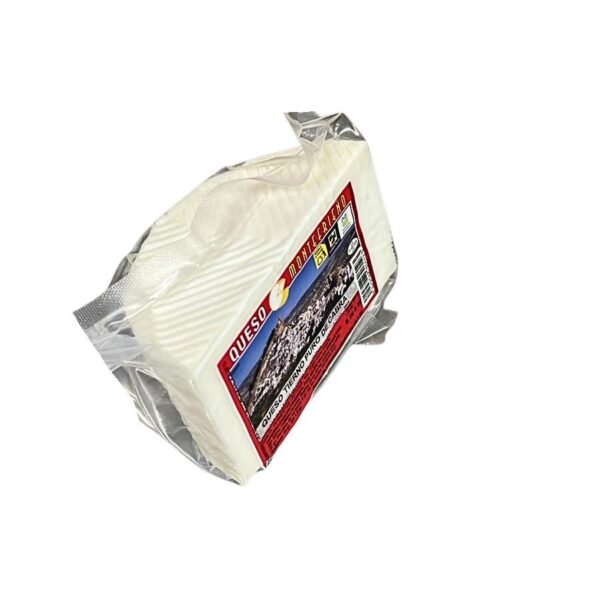 Corte de queso de cabra tierno Montefrieño textura suave elástica