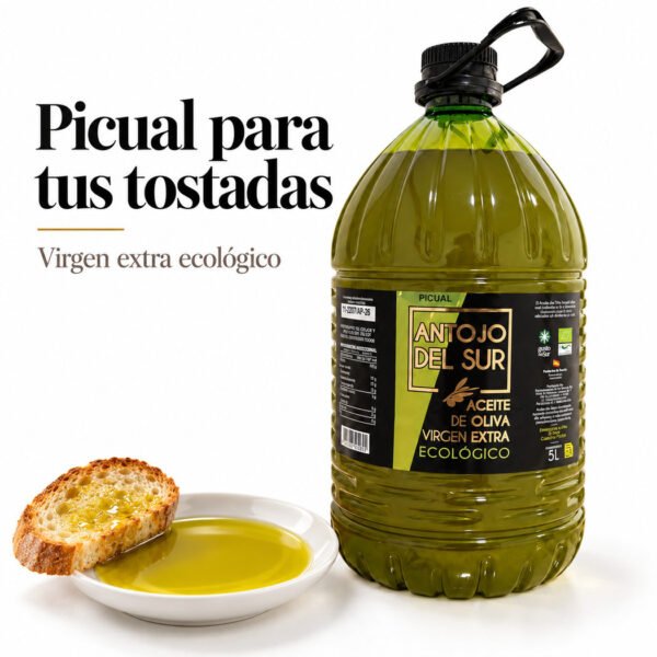 Garrafa de AOVE ecológico Picual Antojo del Sur junto a pan y un cuenco de aceite
